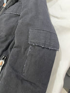 Giubbotto biker imbottito nero con cappuccio foderato bordeaux – dettaglio tasca