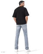 CONTACT SHEET – t-shirt nera oversize con stampa fotografica, indossata da un modello – vista posteriore